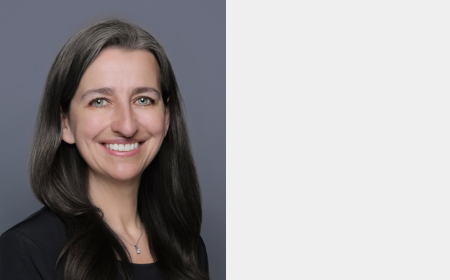 A photo of Associate Professor Catherine Mooney smiling at the camera